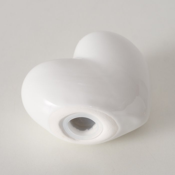 Salt and pepper shaker set in heart shape