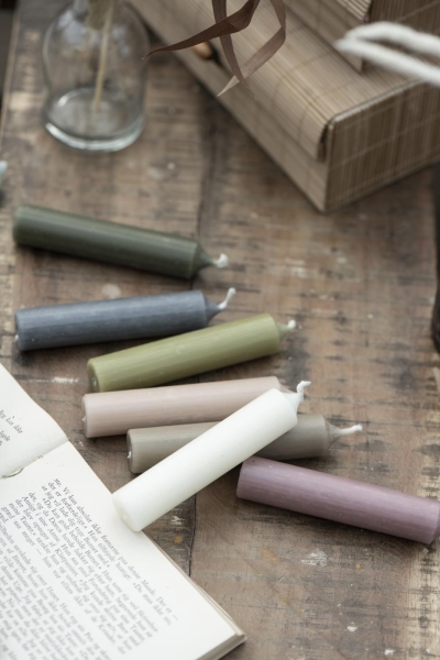 Stick candle sand