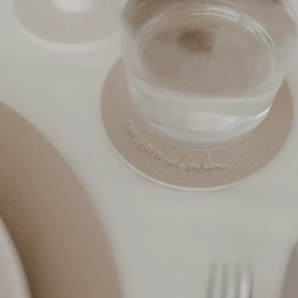 Wendbare Untersetzer „Das Leben“ – Creme (2er Set)