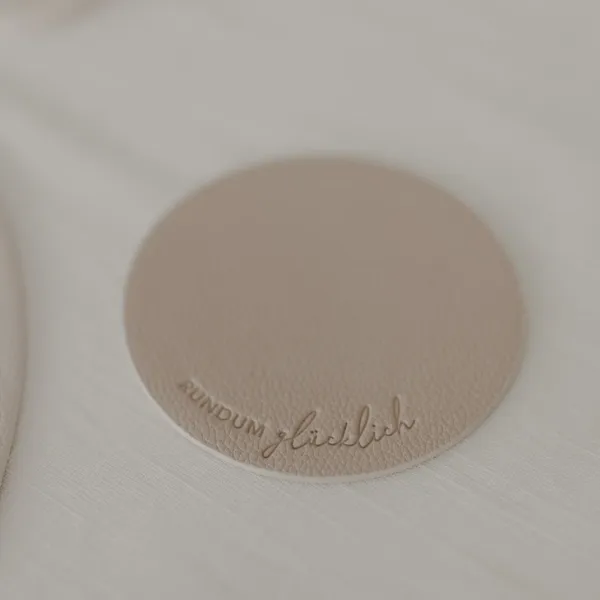Wendbare Untersetzer „Rundum glücklich“ – Creme (2er Set)